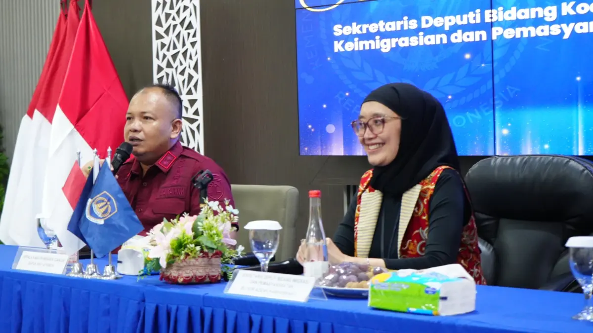 Berkunjung