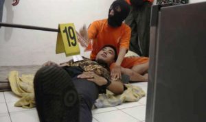 Rekonstruksi pembunuhan pekerja