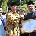 Emil Raih Penghargaan Khidmat Utama