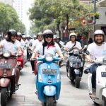 Celebration Riding Vespa