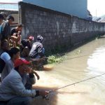 Kali dan Sawah menjadi Buruan Warga saat Banjir