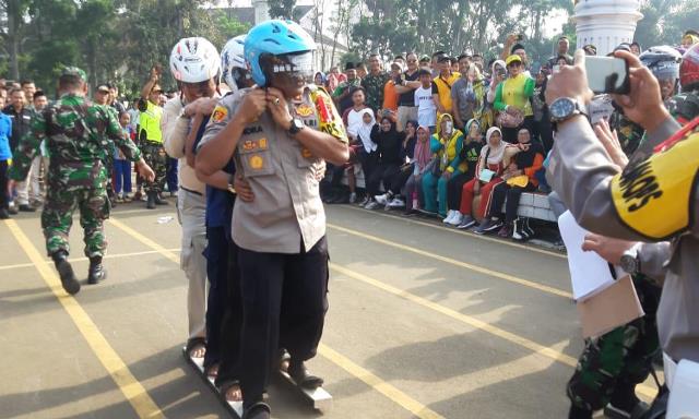 TNI-Polri Bersama Masyarakat Gelar Pesta Rakyat TNI-Polri Bersama Masyarakat Gelar Pesta Rakyat