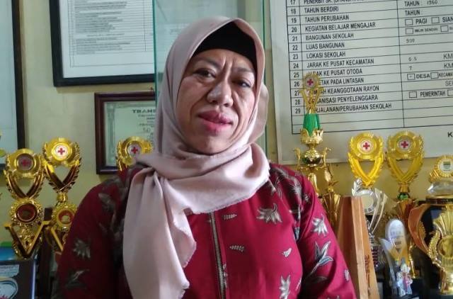 Yuyum Yulianti Edukasi Siswa Lewat Lagu