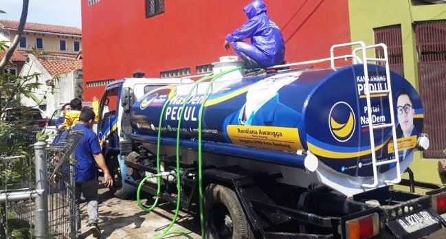 Nasdem Genjot Layanan Penyemprotan Disinfektan