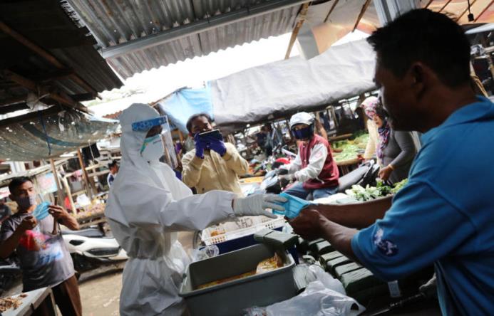 Covid-19 Masuk Pasar Tradisional Covid-19 Masuk Pasar Tradisional