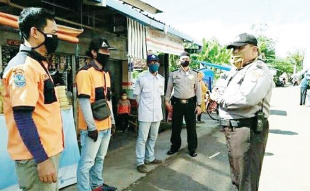 Binmas Kota Banjar Ingatkan Juru Parkir Binmas Kota Banjar Ingatkan Juru Parkir