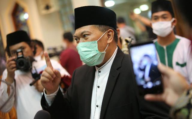 Tak Bermasker Denda Rp 100 ribu Tak Bermasker Denda Rp 100 ribu