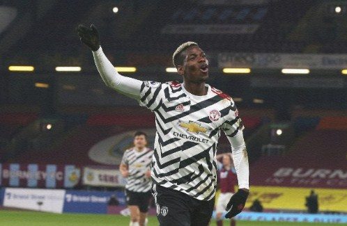 Pemain Manchester United, Paul Pogba berselebrasi usai membobol gawang Burnley, Rabu (13/1). FOTO: @ManUtd/Twitter.