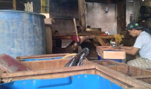 pengrajin tahu mogok produksi