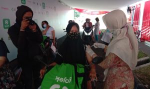 Vaksinasi driver Gojek, beberapa waktu lalu. Foto: Sandi Nugraha/Jabar Ekspres.