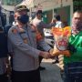 Polsek Sawangan Bagikan Beras di Masa PPKM Level 4