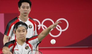 Olimpiade Tokyo 2020: Minions Belum Terhentikan di Pertandingan Kedua Grup A Ganda putra Indonesia Marcus Fernaldi Gideon/Kevin Sanjaya Sukamuljo berlaga melawan pasangan India Satwiksairaj Rankireddy/Chirag Shetty pada penyisihan kedua Grup A Olimpiade Tokyo 2020 di Musashino Forest Sports Plaza, Tokyo, Jepang, Senin (26/7/2021). ANTARA/AFP/Alexander Nemenov