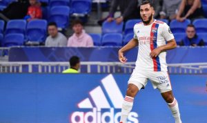 Gelandang Lyon Rayan Cherki berlari menggiring bola ketika pertandingan persahabatan melawan Vfl Wolfsburg di Stadion Groupama, Decine-Charpieu, Lyon, Prancis, 17 Juli 2021. (ANTARA/AFP/PHILIPPE DESMAZES)