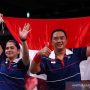 Atlet Para badminton Hary Susanto bersama Leani Ratri Oktila merayakan kemenangan usai melawan atlet Para badminton Prancis Lucas Mazur dan Faustine Noel pada final Mixed Doubles SL3-SU5 Paralimpiade Tokyo 2020 di Yoyogi National Stadium, Tokyo, Jepang, Minggu (5/9/2021). Ganda campuran Indonesia tersebut memenangi pertandingan 23-21 dan 21-17. ANTARA FOTO/REUTERS/Athit Perawongmetha/rwa.