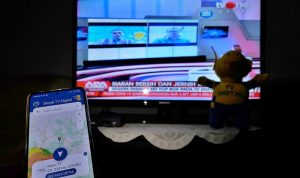 Penggunaan aplikasi sinyaltvdigital untuk membantu mencari tahu apakah sinyal TV Digital sudah ada atau belum, (ilustrasi)