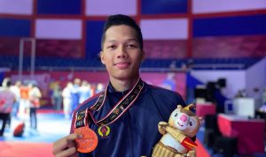 PON XX Papua, Atlet Asal Cimahi Sabet Perunggu Cabor Taekwondo Hendro Gunawan atlet Taekwondo asal Cimahi perwakilan Jawa Barat meraih medali perunggu. (Dokumentasi/KONI Cimahi)