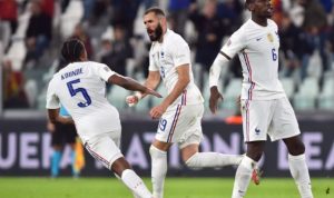 Hujan Gol, Prancis Menang Dramatis Lawan Belgia Penyerang timnas Prancis Karim Benzema (tengah) merayakan golnya dalam pertandingan lawan Belgia di semifinal UEFA Nations League di Allianz Stadium, Turin, Italia pada 8 Oktober 2021. ANTARA/REUTERS/MASSIMO PINCA.