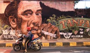 ILUSTRASI Mural rokok. (Jawapos)
