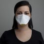 Ilustrasi perempuan sedang menggunakan respirator. (Pixabay)