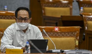 Begini Upaya LADI Penuhi Syarat Kepatuhan WADA Ketua Lembaga Anti Doping Indonesia (LADI) Mustafa Fauzi mengikuti rapat dengar pendapat umum (RDPU) dengan Komisi X DPR di Kompleks Parlemen, Senayan, Jakarta, Senin (8/11/2021). ANTARA FOTO/Galih Pradipta/foc. (ANTARA FOTO/GALIH PRADIPTA)