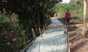 Pembangunan jalan desa untuk menata kawasan permukiman kumuh