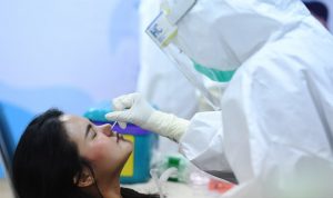 ilustrasi pemeriksaan hasil tes Covid-19