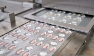 Paxlovid, pil Covid-19 dari Pfizer. Inggris akan meluncurkan pil antivirus Covid-19 Pfizer bagi kelompok rentan mulai Februari. (Pfizer/Handout via REUTERS/Jawapos)