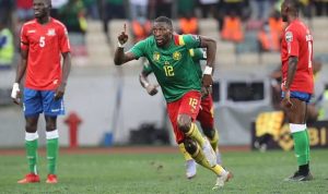 Ekambi dan Ucapan Rudi Garcia, Kualitasnya Sudah Terbukti Karl Toko Ekambi memborong dua gol kemenangan Kamerun atas Gambia di Stade de Japoma, Douala, kemarin (30/1). (CHARLY TRIBALLEAU/AFP )