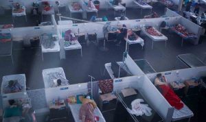 Angka Kematian Akibat COVID-19 Dilaporkan Capai 500.000 di India Para pasien dirawat di pusat karantina COVID-19 di Navi Mumbai, India, Selasa (11/1/2022). ANTARA FOTO/REUTERS/Francis Mascarenhas/rwa.