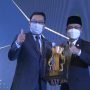 Gubernur Jawa Barat Ridwan Kamil memberikan penghargaan langsung sebagai Kabupaten Terbaik ke III Penyusunan Rencana Kerja Perangkat Daerah (RKPD) kepada Dadang Supriatna pada event Penghargaan Pembangunan Daerah (PPD) Tingkat Provinsi Jawa Barat 2022.