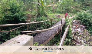 Jembatan Gang Keyep, Kampung Bandang Tonggoh RT 12/04 Desa Tegalpanjang, Kecamatan Cireunghas, Kabupaten Sukabumi.