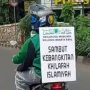 Salah satu pengendara motor yang mengikuti konvoi kelompok Khilafatul Muslimin. Polisi beberkan aliran dana yang masuk ke jaringan tersebut. (tangkapan layar video)