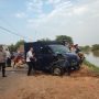 Mobil berisi koper penuh uang yang masuk didalam sungai berhasil dievakuasi, berikut isinya telah diamankan. GEMAH ABDILLAAH/KARAWANG BEKASI EKSPRES
