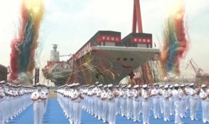 Kapal Induk Fujian diluncurkan pada hari Jumat dalam apa yang dikatakan media pemerintah sebagai upacara 'singkat tapi meriah' [CCTV/AFP Photo]