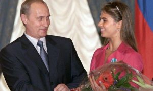 Awal kedekatan Presiden Putin dengan Aline Kabaeva. ((AFP PHOTO EPA POOL/SERGEI CHIRIKOV)