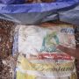 Salah satu kemasan dari beras bansos yang dikubur di Depok.--Antara