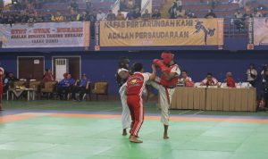 RAIH PRESTASI: Muhammad Ridwan sabet medali emas Tarung Derajat.