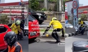 VIRAL! Driver Ojol Selamatkan Anak Kucing yang Ada Di Kolong Mobil Saat Mobil Melaju