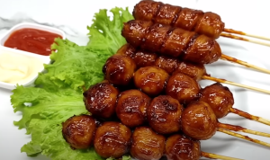 Resep Bumbu Baso dan Sosis Bakar, Enak Banget!/Foto: Tangkapan Layar YouTube (CR KOOK)