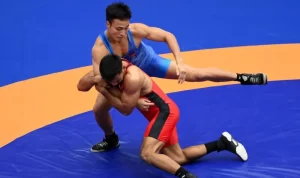 Wrestling Reaches Gold Medal Target on First Day of Competition
