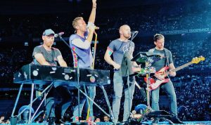 peran musik coldplay