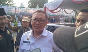 Plt Bupati Bogor saat mengunjungi Kecamatan Babakan Madang. Foto: Sandika fadilah/Jabarekspres.com
