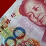 Chinese Yuan Cuts 107 Basis Points to 7.2208 Against the US dollar