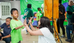 Ribuan Anak Mitra Pengemudi Rayakan Hari Anak Nasional dengan Sepatu Berdesain Khusus Gratis dari Grab