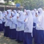 Hukum mengenakan hijab dengan rambut kelihatan. (ist)