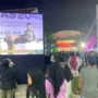 Tampak Bakal Calon Presiden Ganjar Pranowo dari layar lebar, saat memberikan seminar nasional di GOR Mbah Muqoyyim Pesantren Buntet, Cirebon.