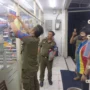 Kepala Bidang Gakda Satpo PP dan Damkar Kota Cimahi Ranto Sitanggang memasang stiker di bagian depan toko modern yang melanggar jam operasional.
