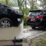 Mobil Dinas Kadispora Lubuk Linggau Terobos Jalan Cor Basah