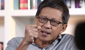 Rocky gerung di laporkan ke polisi karena di duga menghina presiden jokowi