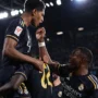 Pemain Real Madrid berselebrasi atas gol Jude Bellingham di menit ke-81.